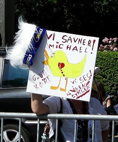 A Rasmussen fan with a home-made poster saying: "We miss Michael"  